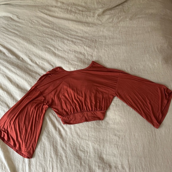 Lulu’s Turn of Events Rust Orange Reversible Long Sleeve crop top - Picture 5 of 5